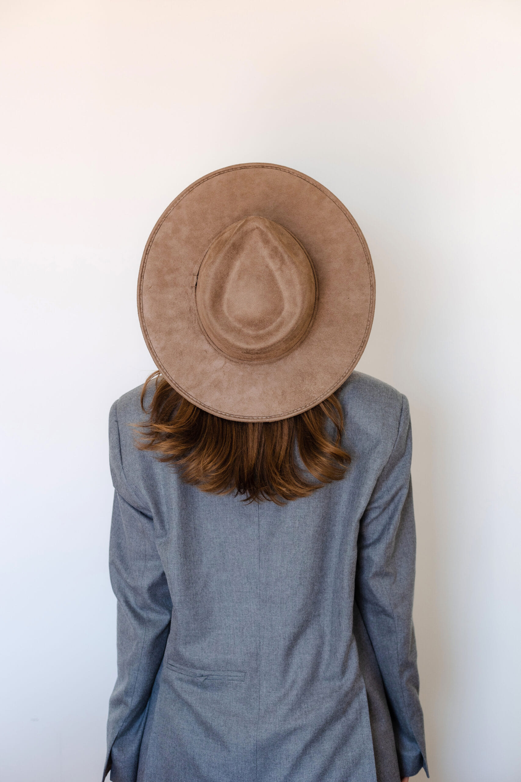 A moka colored hat made in Mexico made from synthetic suede
