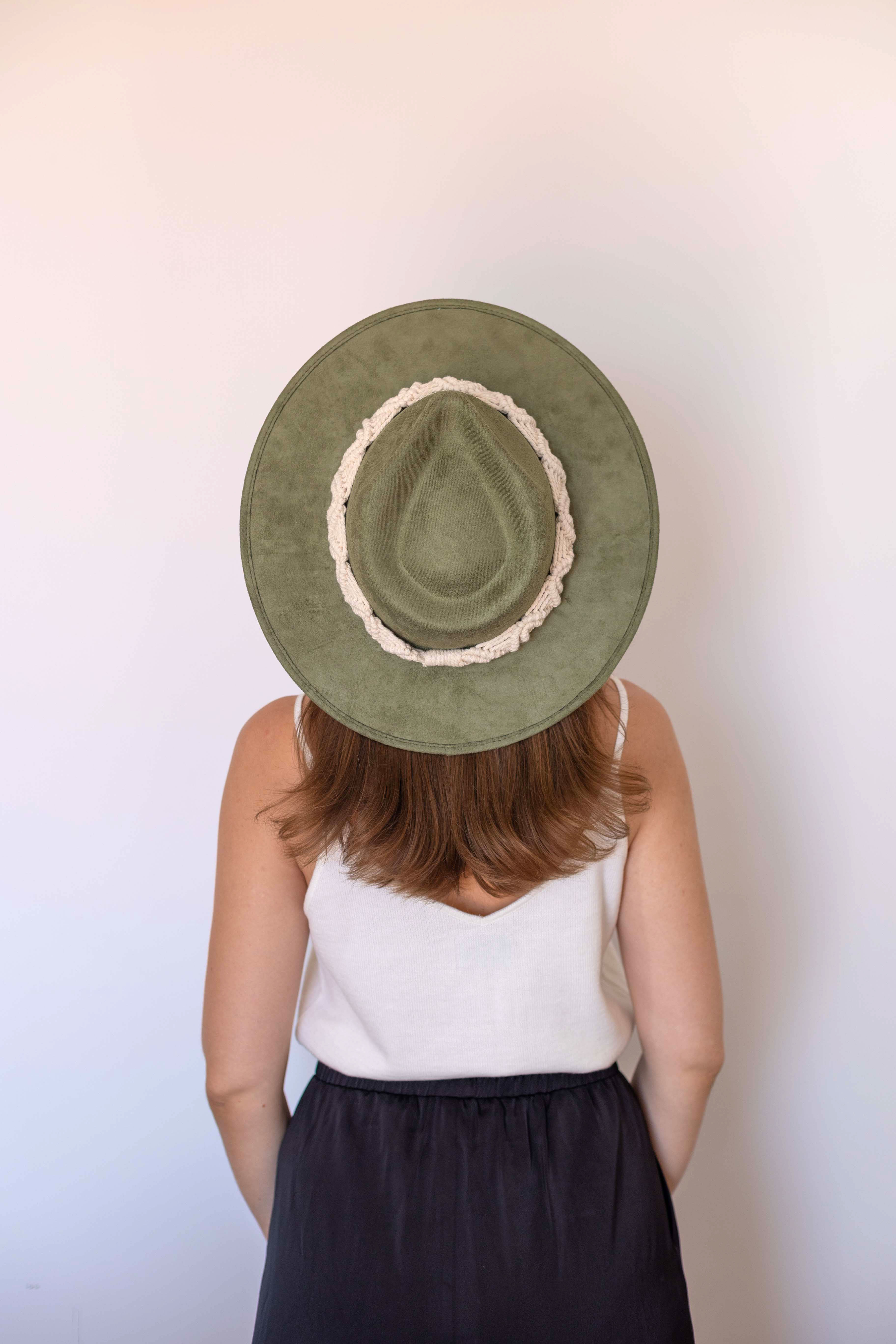 A cream colored hat accessory made in Mexico. Macrame stye âCancunâ